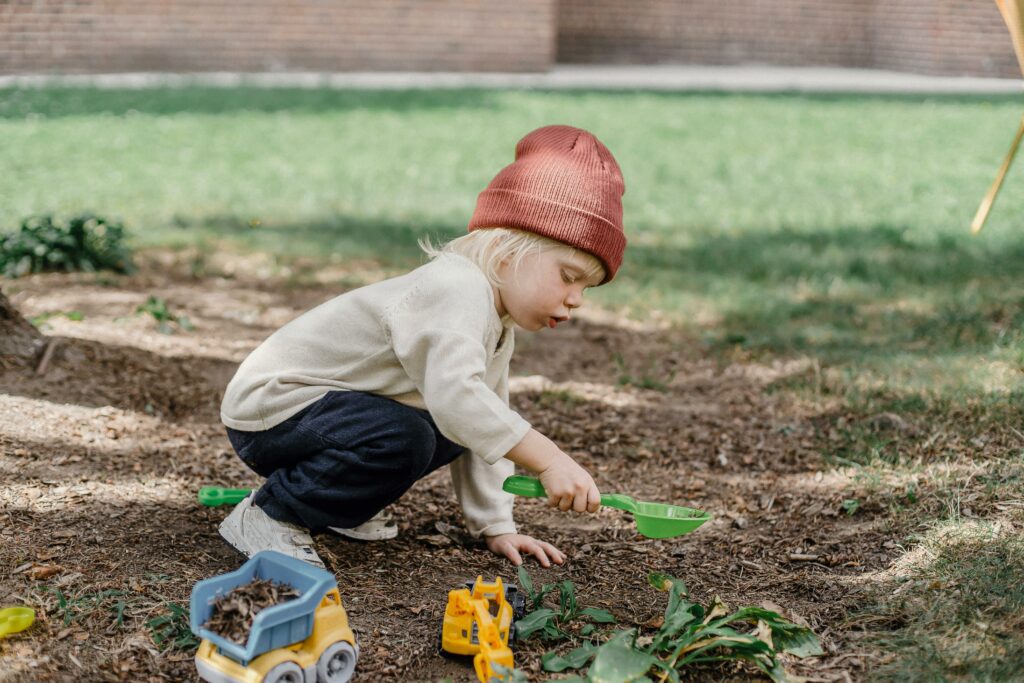 Boy with garden shovel